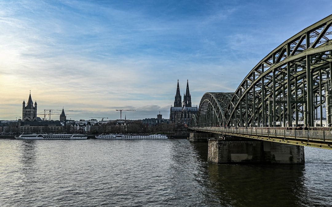 3-Cologne-viewpoint-Hohenzollern Bridge View from the Hohenzollern Bridge viewpoint of Cologne Cathedral, the old town, and ships on the Rhine. - angiestravelroutes.com
