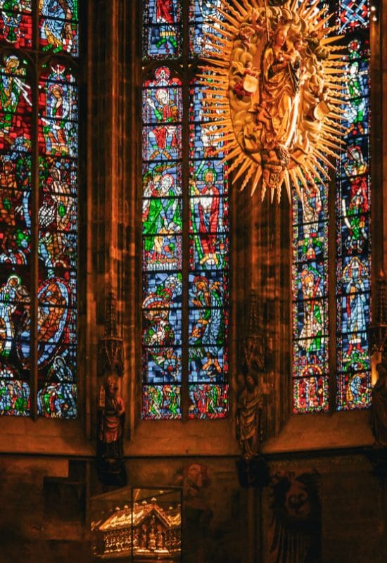 aachen cathedral choir hall Aachen Cathedral, choir hall - 3 high colorful windows, the Madonna of the Radiant Wreath at the top right, the shrine of St. Charles at the bottom of the picture - angiestravelroutes.com