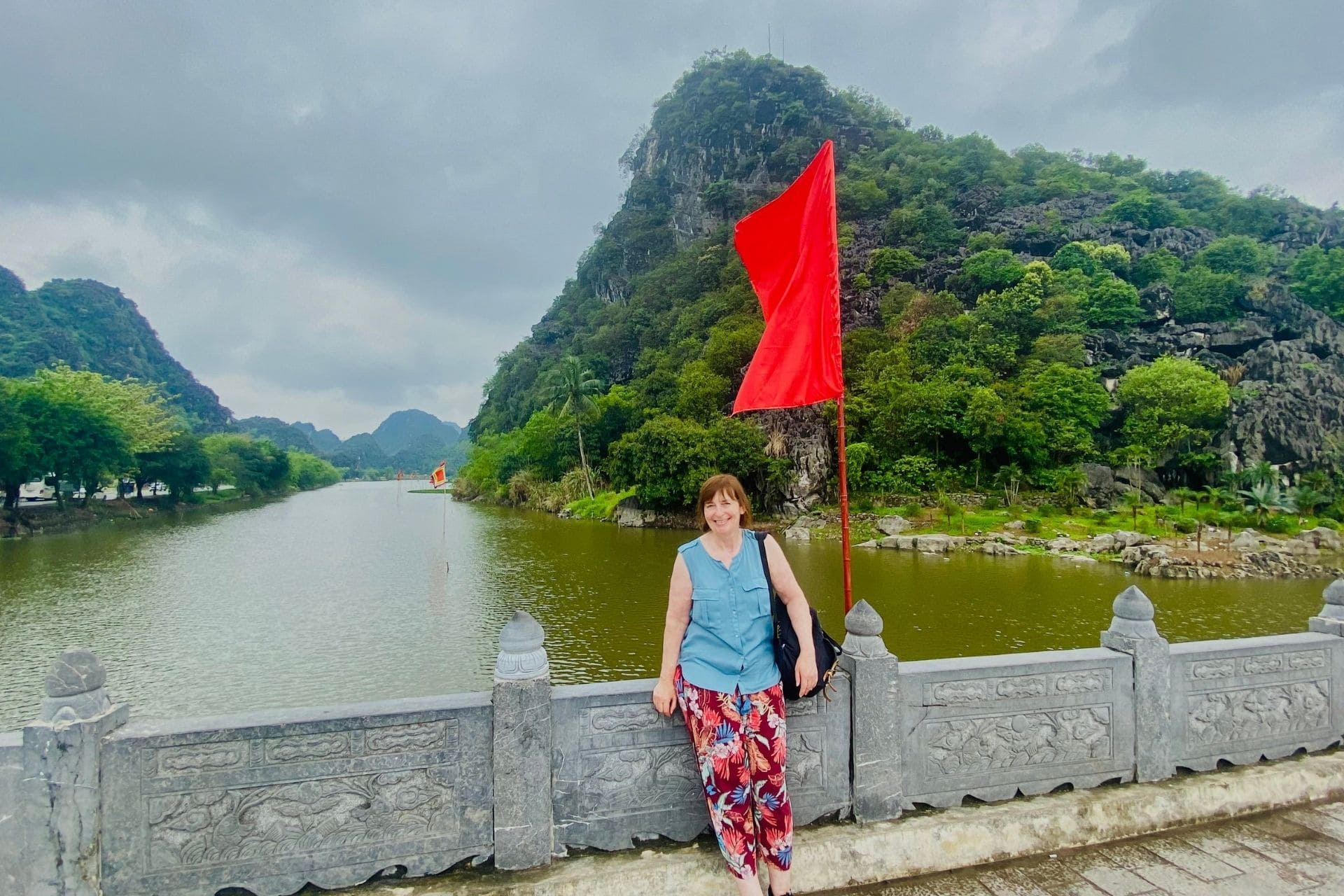 bb-hoa-lu-bridge-angelika Me on the bridge to the ancient imperial city of Hoa Lu, Ninh Binh Province, Vietnam - angiestravelroutes.com