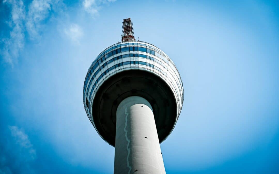 Stuttgart television tower - tower cage and transmission mast photographed from below, in the background the deep blue sky - angiestravelroutes.com