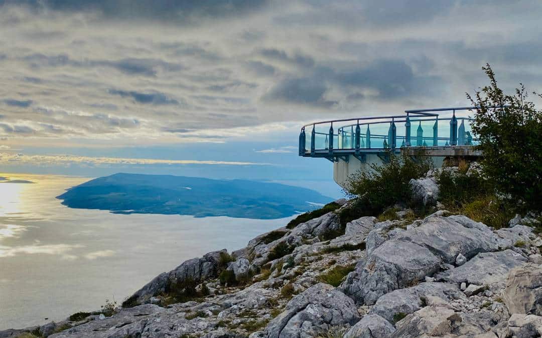 Biokovo Skywalk - View of the Skywalk with the Adriatic Sea in the background from the mountain road - angiestravelroutes.com