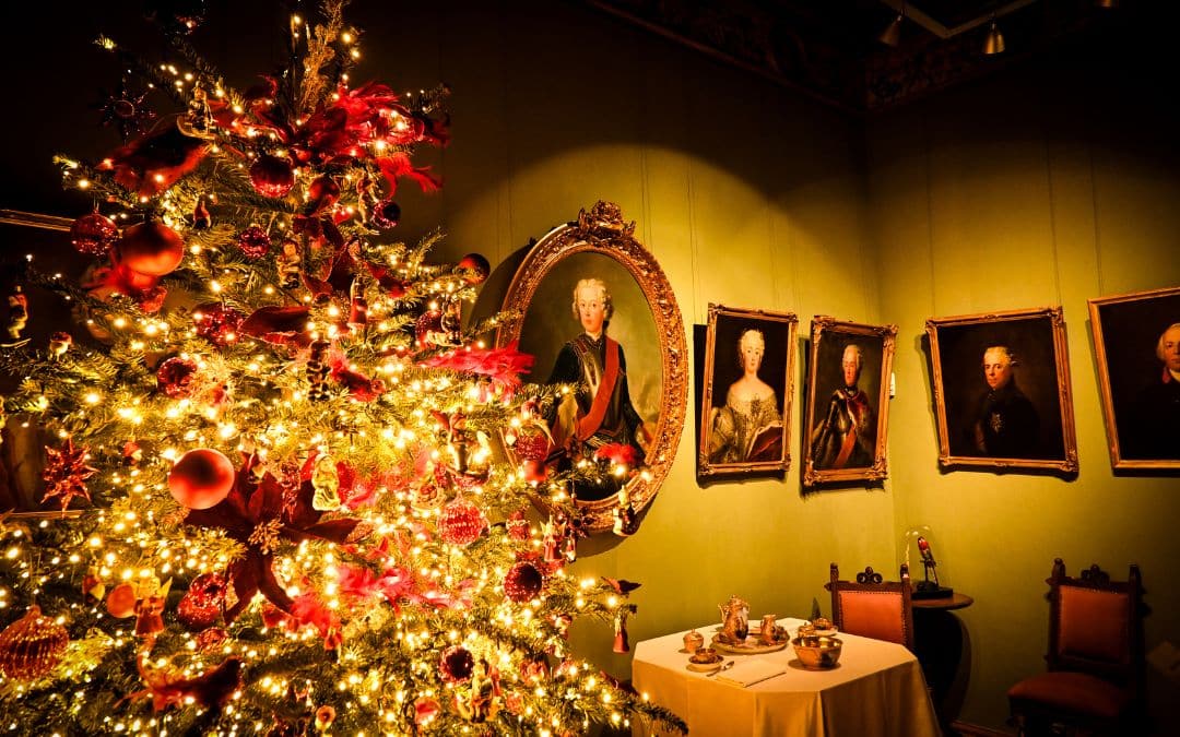 Hohenzollern Castle - Christmas tree with red baubles and lots of lights in one of the royal chambers - angiestravelroutes.com