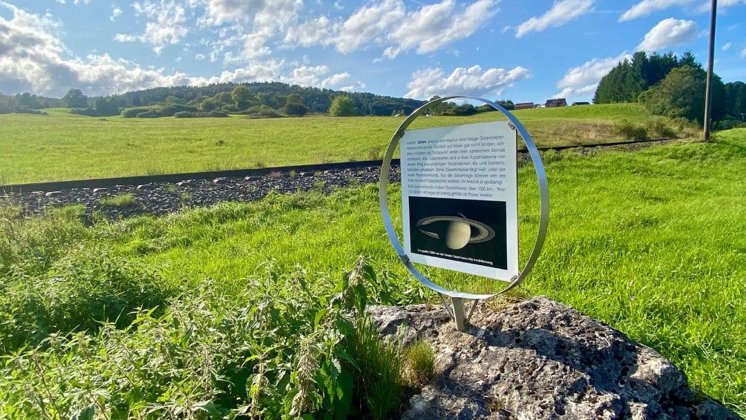 Gomadingen, Planetenweg - Information sign about Saturn, Sternberg in the background - angiestravelroutes.com