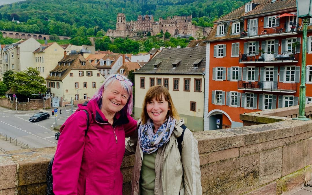 Heidelberg - Old bridge - Judith and Angelika - in the background the castle ruin - angiestravelroutes.com