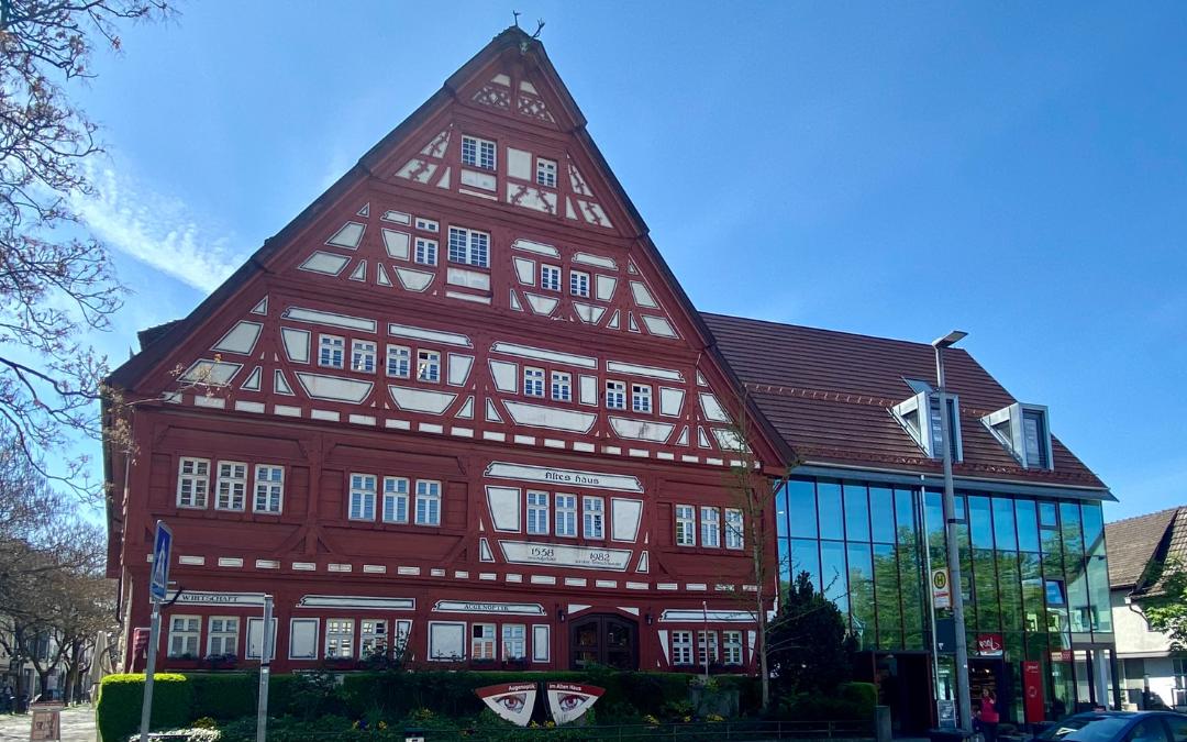 Old house, Kirchheim - elaborate red half-timbering, attached modern glazed building - angiestravelroutes.com