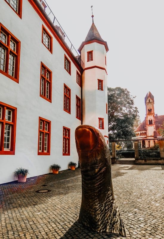The Bronze Thumb, "Le Pouce," in front of the Ludwig Museum