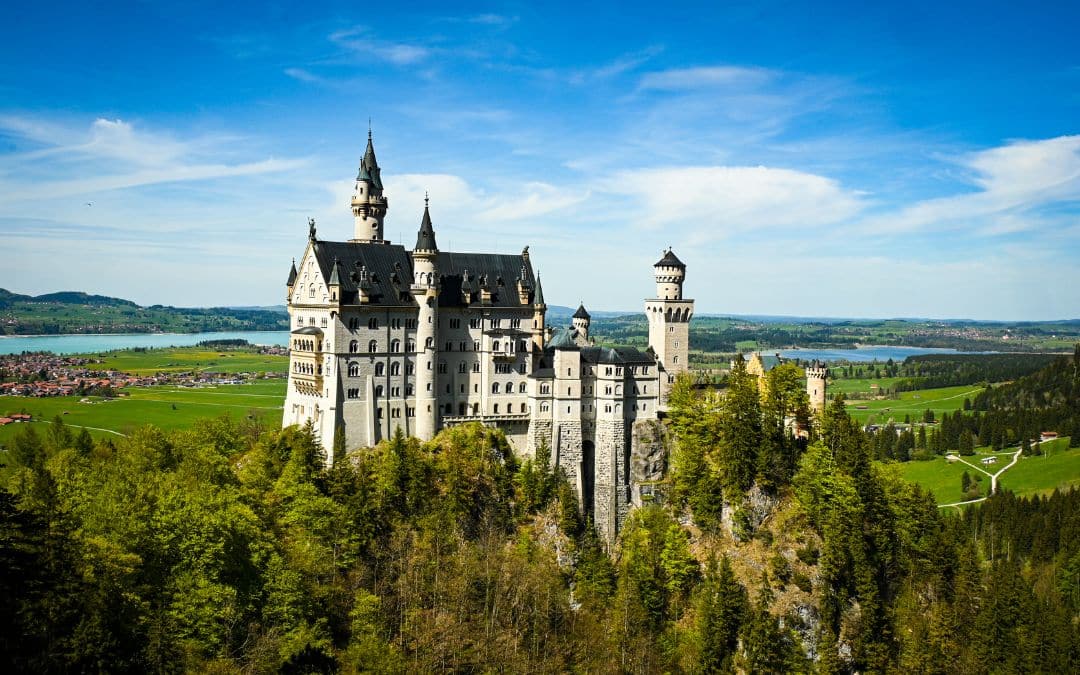 Neuschwanstein Castle, Schwangau - view from the Marienbrücke bridge, with the Füssen lake landscape in the background