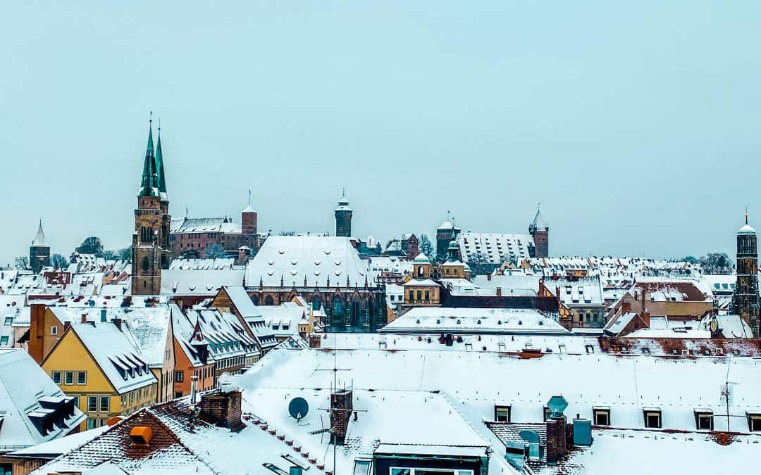 Nuremberg Old Town - View of the snow-covered Old Town with St. Sebald's Church and Imperial Castle from the Adlerparkhaus - angiestravelroutes.com