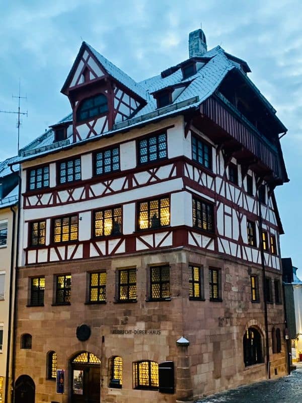 Albrecht Dürer House Nuremberg - beautifully renovated house with hipped roof, bay window and sandstone plinth up to the 1st floor, above that 2 floors of half-timbering - angiestravelroutes.com