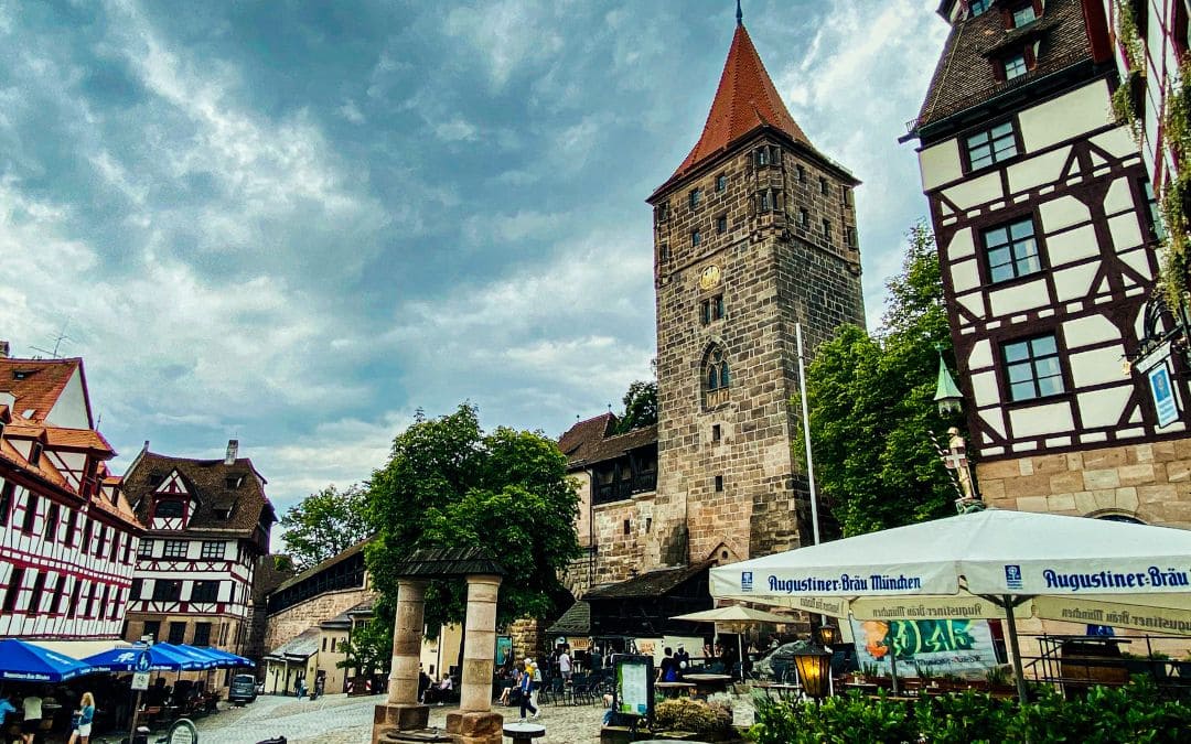 Nuremberg, Tiergärtnertorplatz - View from the restaurant "Zum Albrecht Dürer Haus" onto the square, on the left behind the Albrecht Dürer House, on the right in the picture the Tiergärtnertor Tower - angiestravelroutes.com