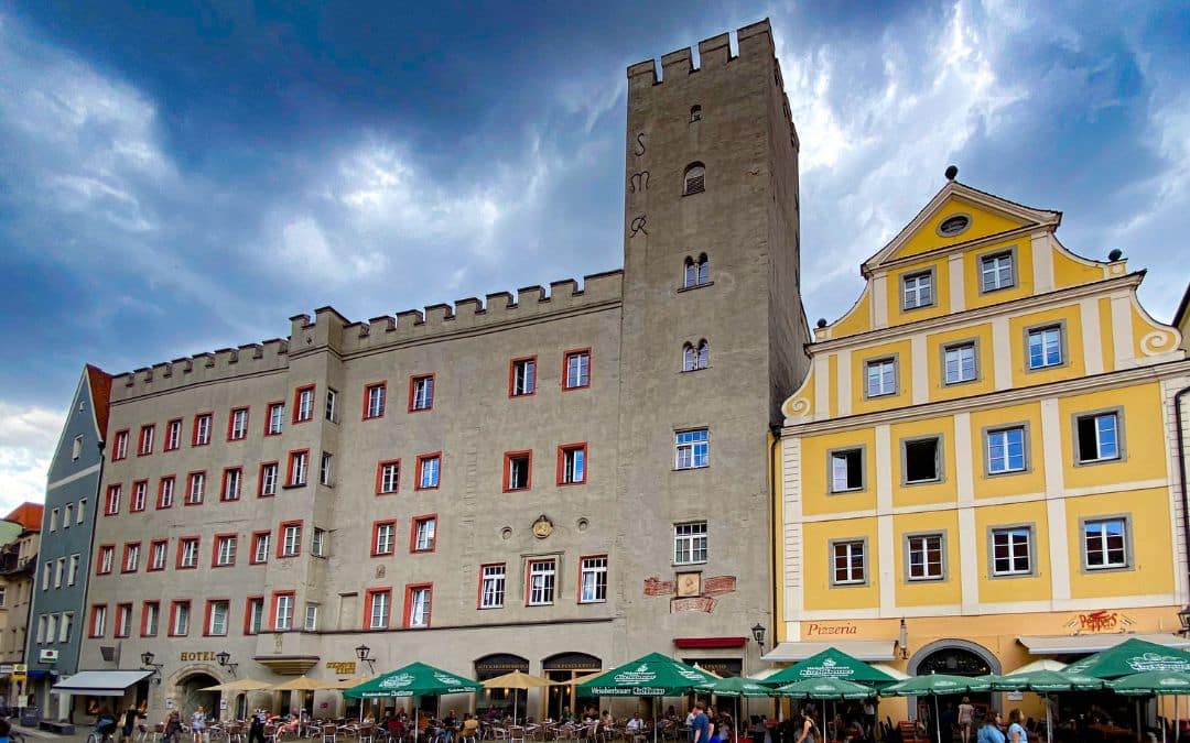 Hotel Goldenes Kreuz on Regensburg's Haidplatz - castle-like building with battlements and tower - angiestravelroutes.com