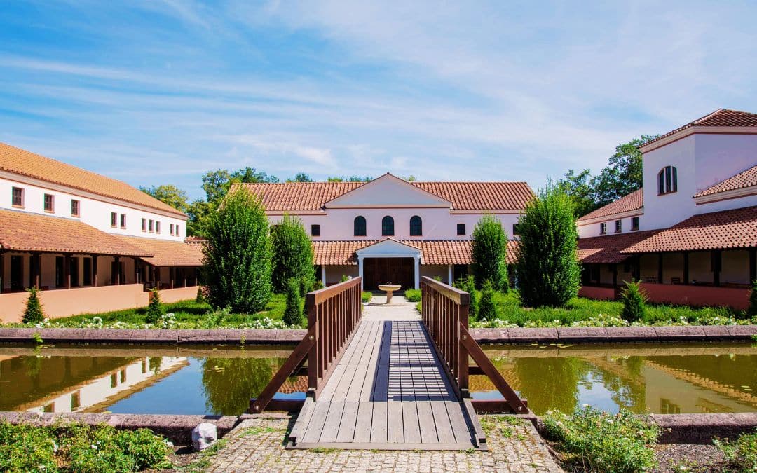 Reconstructed Roman Villa Borg with a pond and wooden walkway in Perl-Borg