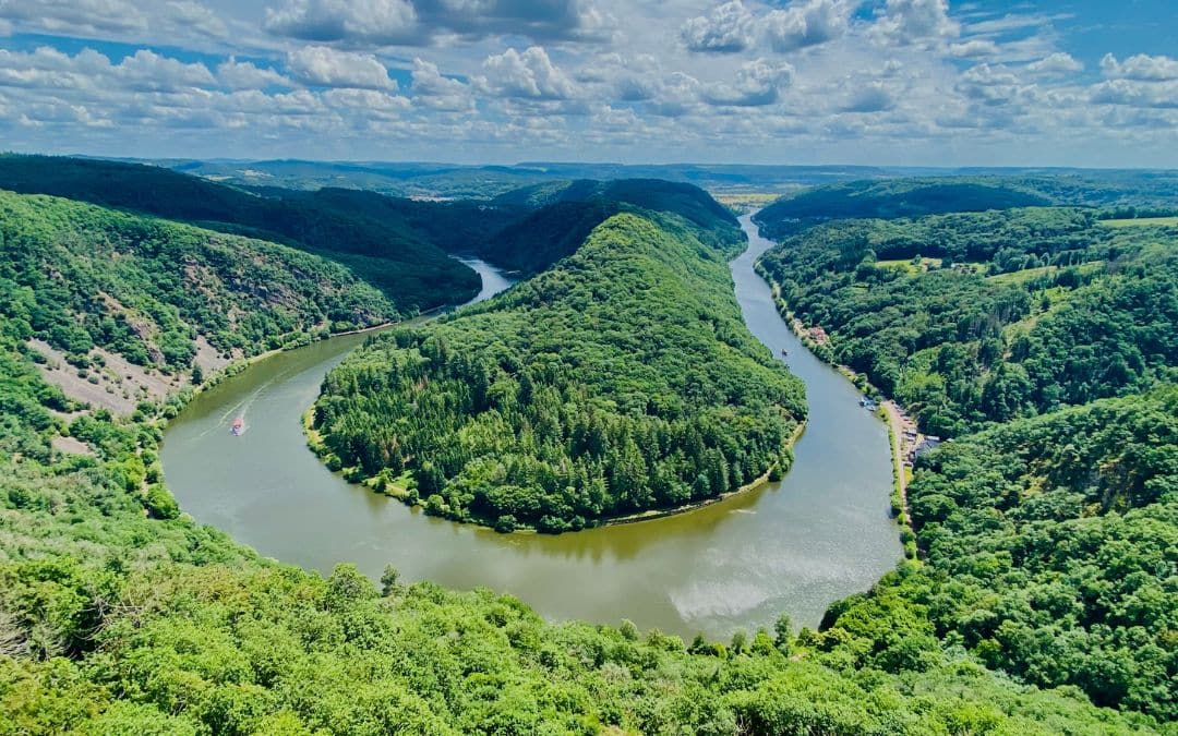View of the Saar Loop near Mettlach between densely forested mountain ranges