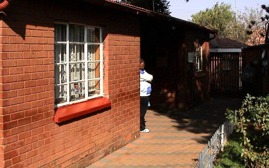 Mandela House, Soweto, Johannesburg, South Africa - former home of Nelson Mandela photographed from the front. In the entrance area, half of the house wall is an employee - angiestravelroutes.com