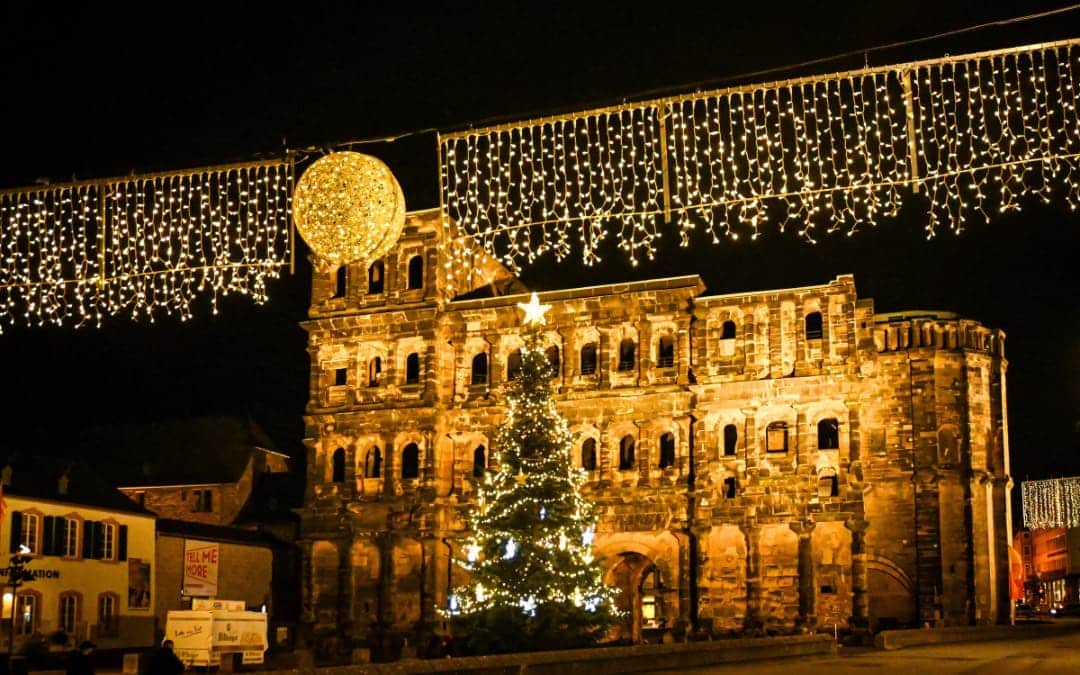 Trier - Porta Nigra with illuminated Christmas tree - angiestravelroutes.com